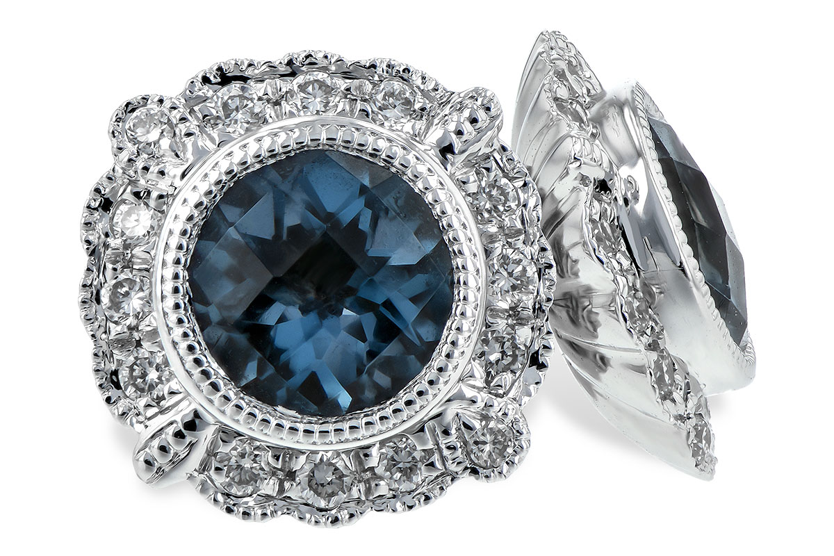 F243-93202: EARR 1.03 BLUE TOPAZ 1.17 TGW